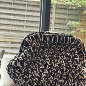Black and brown handmade crochet clutch by Nena Crochet Art
