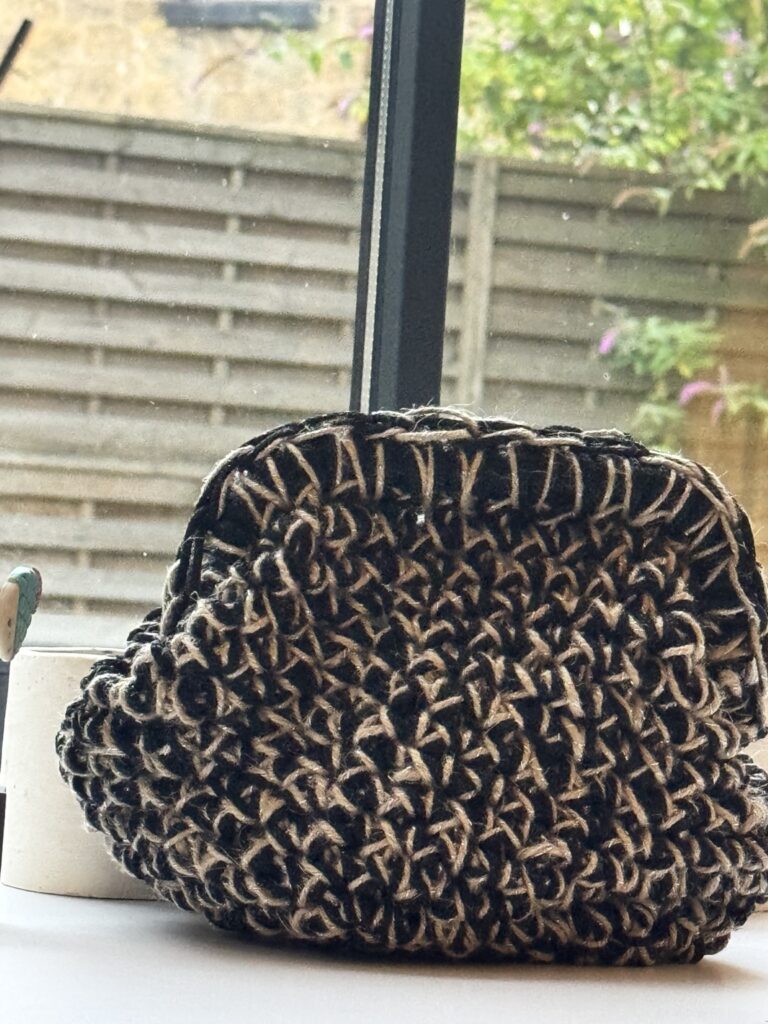 Black and brown handmade crochet clutch by Nena Crochet Art